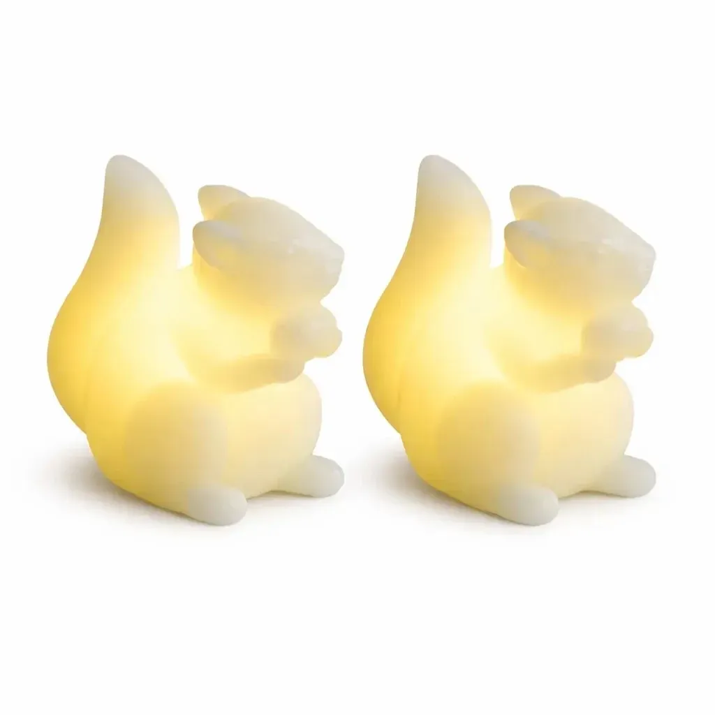 Battery-powered LED candles made of real wax, squirrel design, 7.5 × 9 cm, white, set of 2, CR2032