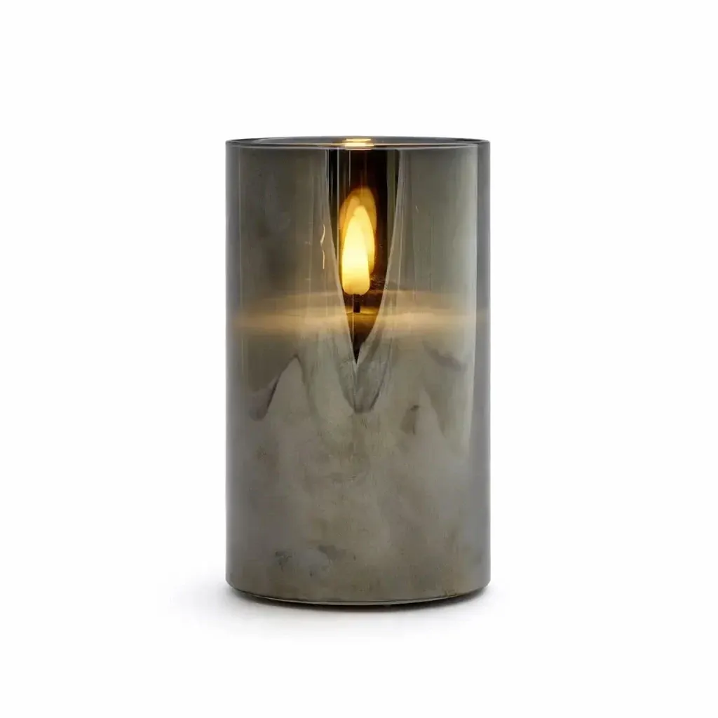 Battery operated LED candle in glass, Ø 7,5 × 15 cm, grey, 2× AA, warm white