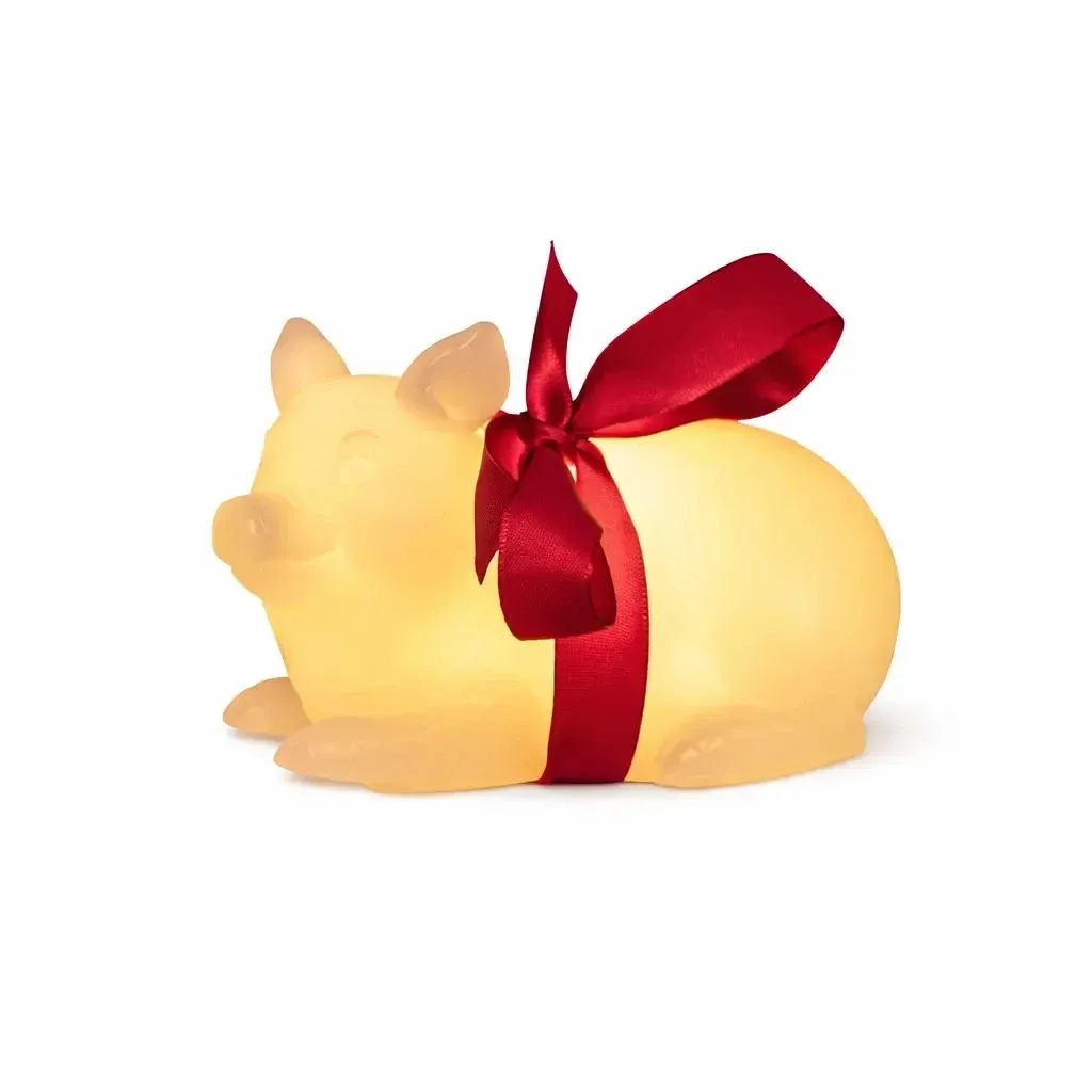 Battery-powered LED candle made of real wax, pig shape, white, 4 × 12 cm, CR2032